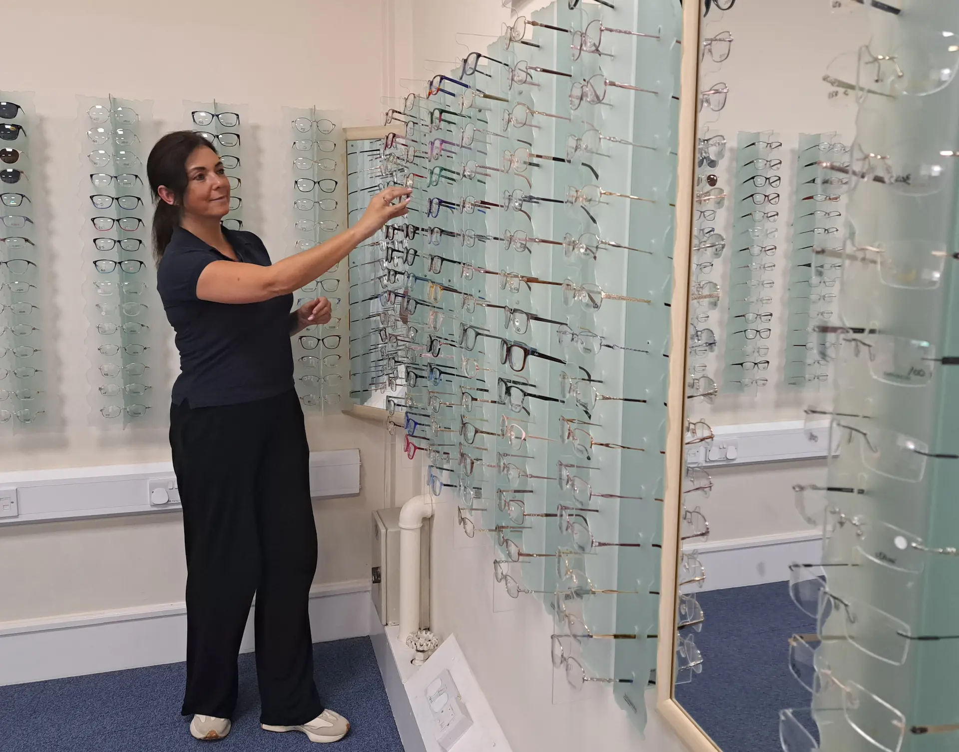 The mint frame wall inside Cwmfelin Opticians, Carmarthen Road, Swansea